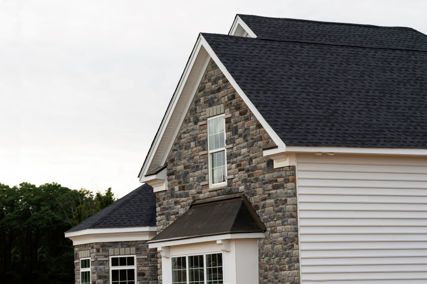 Aguawater Restoration & Roofing newly installed roof on residential home